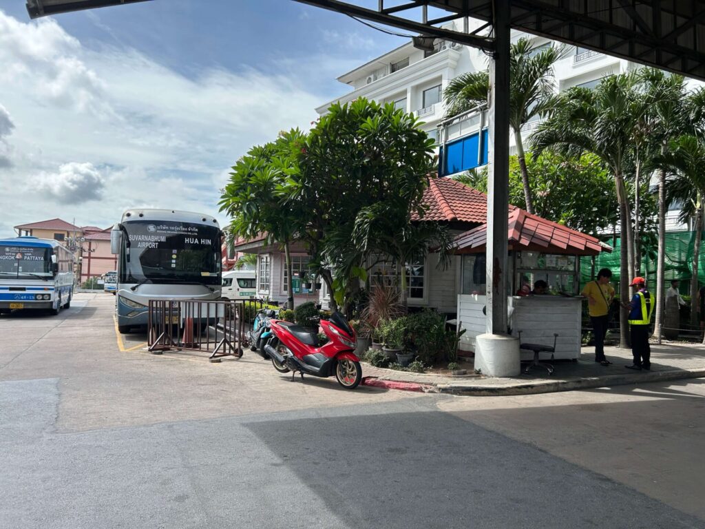 Bell Travel Service bus parked at a terminal 