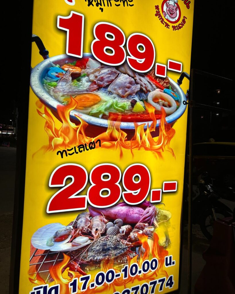 Signboard showing Mookata buffet prices, 189 and 289 baht options
