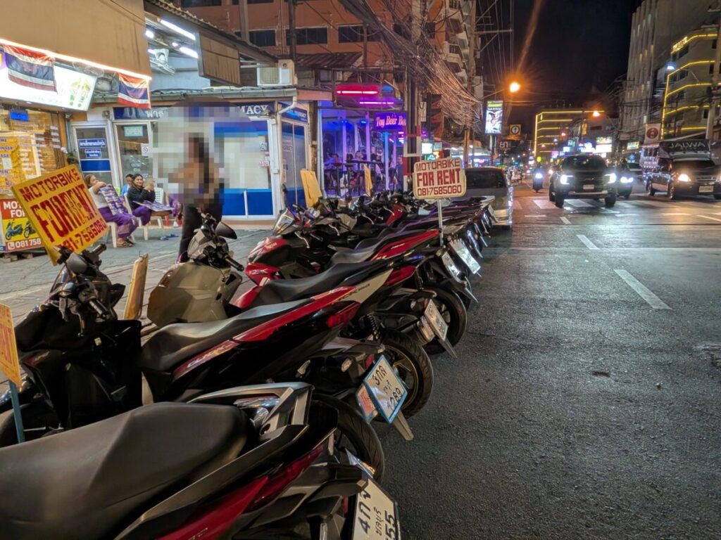 Motorbike rental safety reminding helmet & license rules