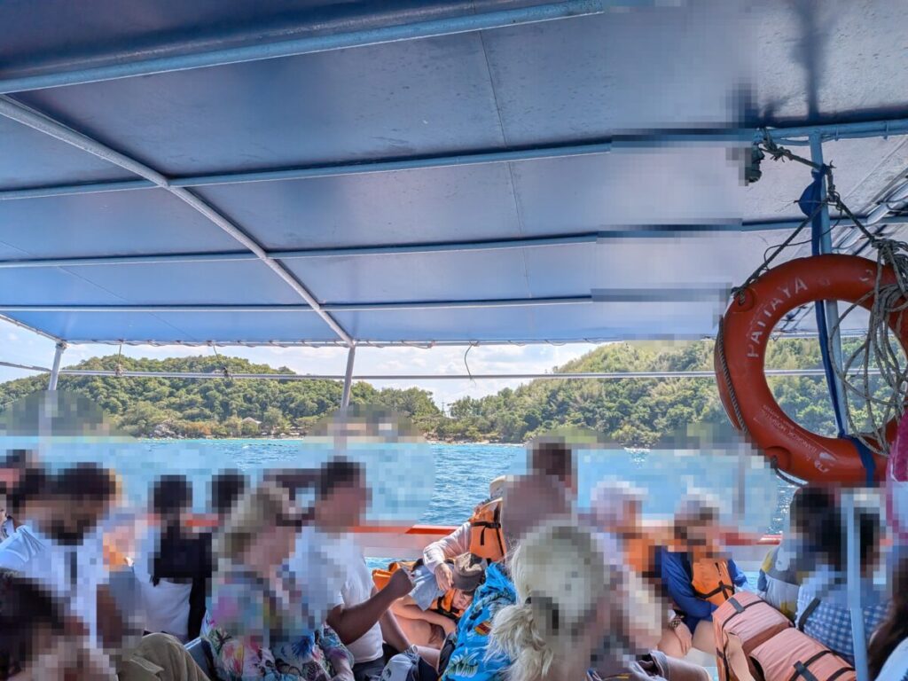 Passengers on the early morning ferry from Pattaya to Koh Larn, enjoying a relaxed ride before the crowds