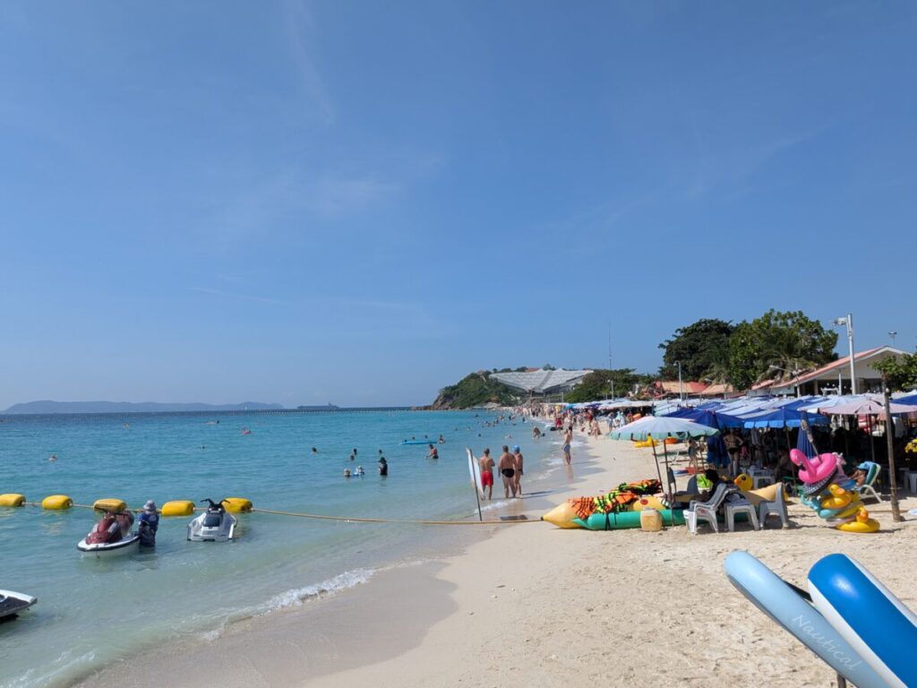 Panoramic view of Samae Beach on Koh Larn with hillside structure