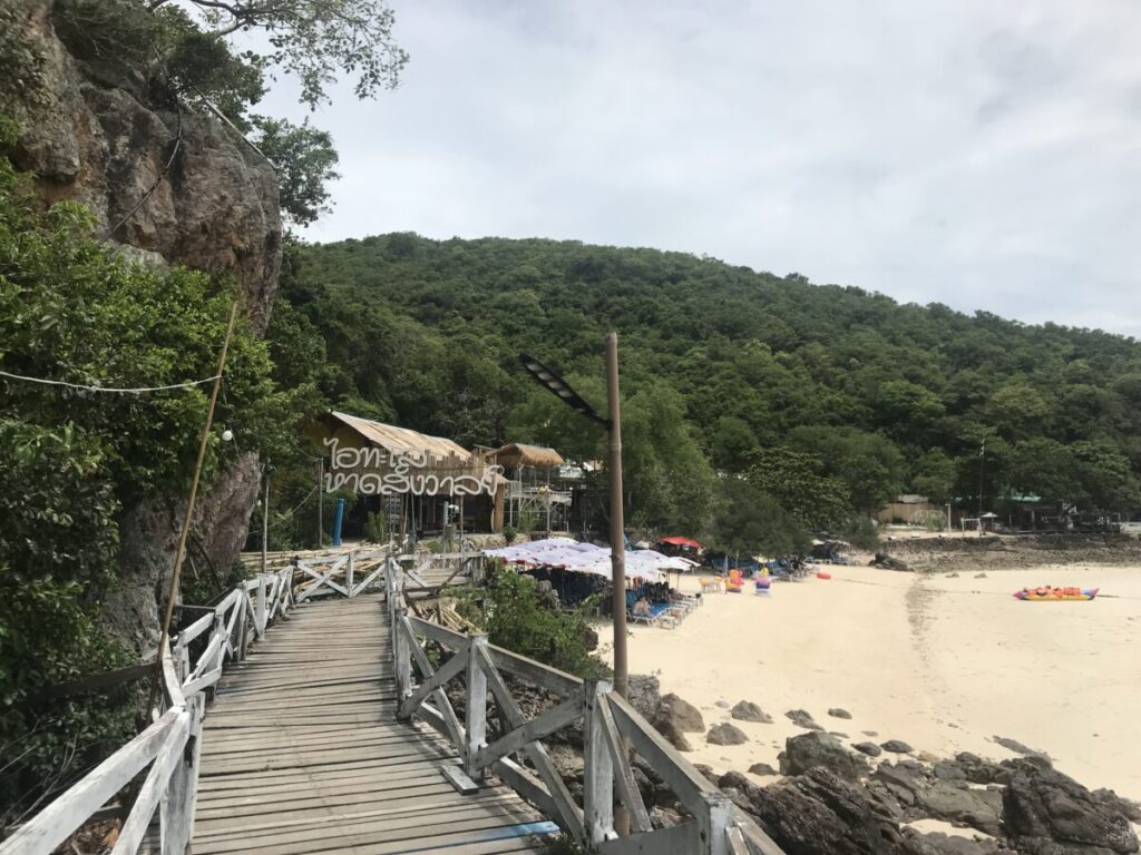 Wooden walkway and sandy beach view on Koh Larn near Pattaya