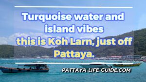 Turquoise water and boats at Tawaen Beach on Koh Larn near Pattaya