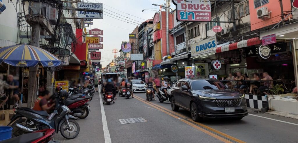 Street scene in Soi Buakhao Pattaya with local shops, markets, and budget accommodation area
