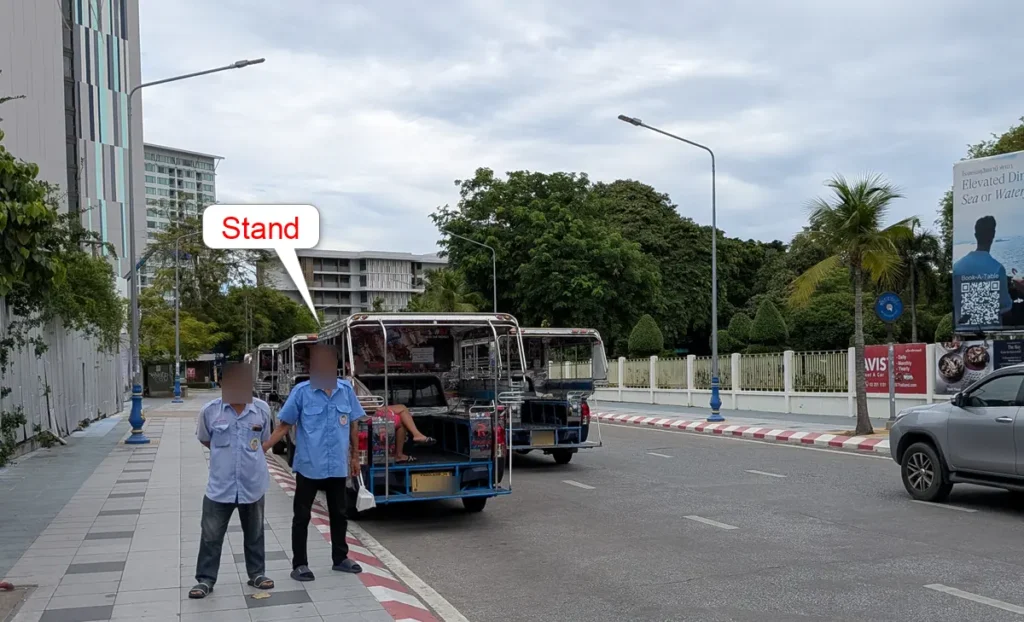 Songthaews waiting at Beach Road Route Stand 1 near Dolphin Circle in Pattaya (June 2026)