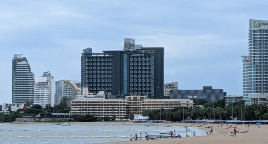 A peaceful beach in North Pattaya with upscale hotels and a calm coastline.