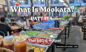 Busy Mookata buffet in Pattaya with fresh ingredients and local diners